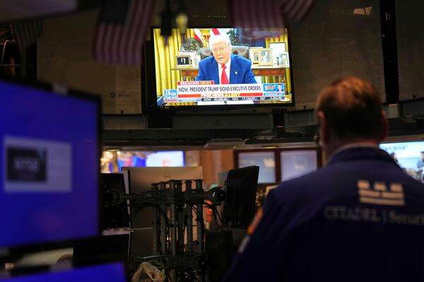 President Donald Trump is displayed on a television on the floor at the New York Stock Exchange in New York, Wednesday, April 9, 2025. (AP Photo/Seth Wenig)