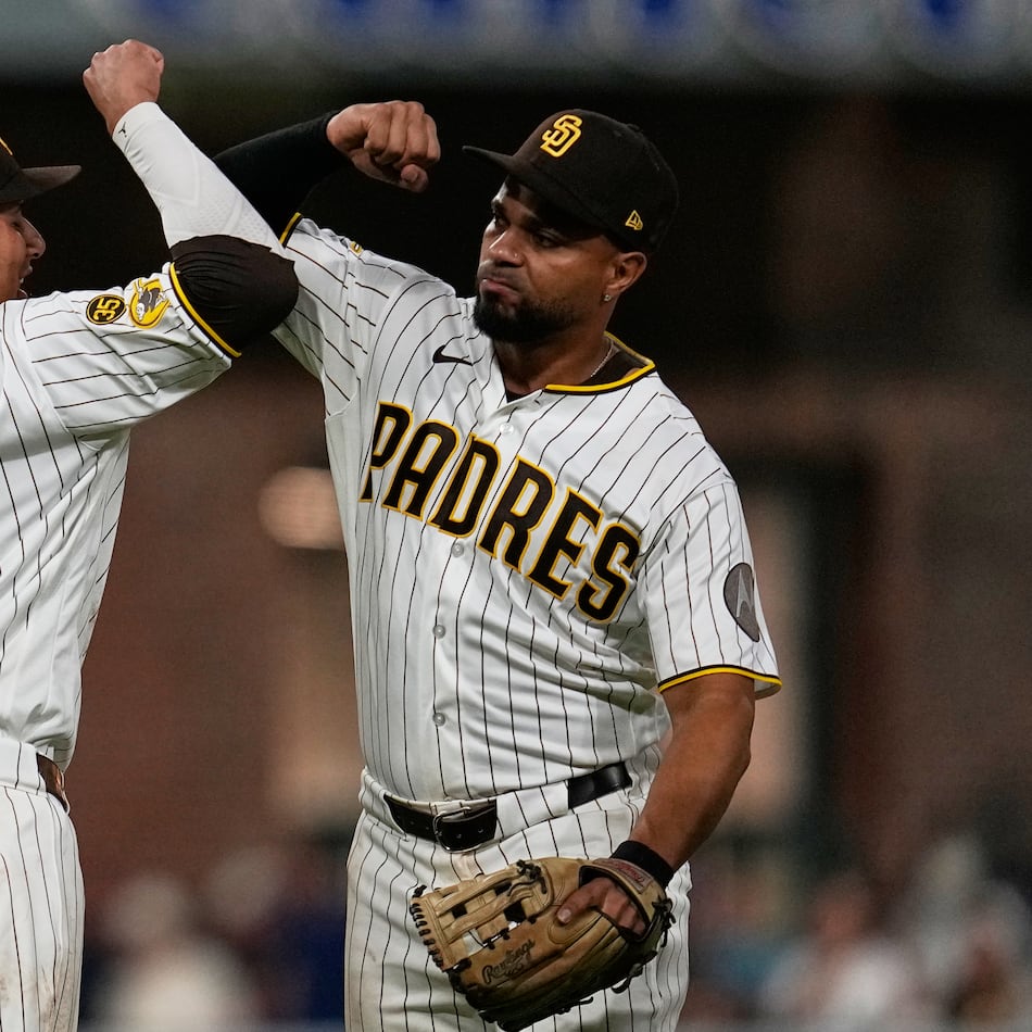 Padres third baseman Manny Machado (left) celebrates his winning homer with shortstop Xander Bogaerts after defeating the Braves, 1-0, on Monday, June 22, 2026, in San Diego. (Gregory Bull/AP)