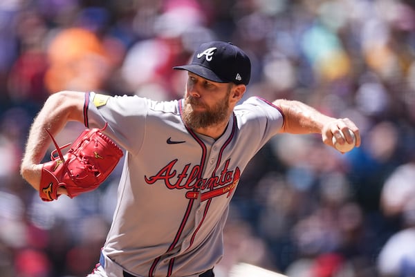 Atlanta Braves starting pitcher Chris Sale works against the Colorado Rockies in the fifth inning of a baseball game Wednesday, April 30, 2025, in Denver. (AP Photo/David Zalubowski)