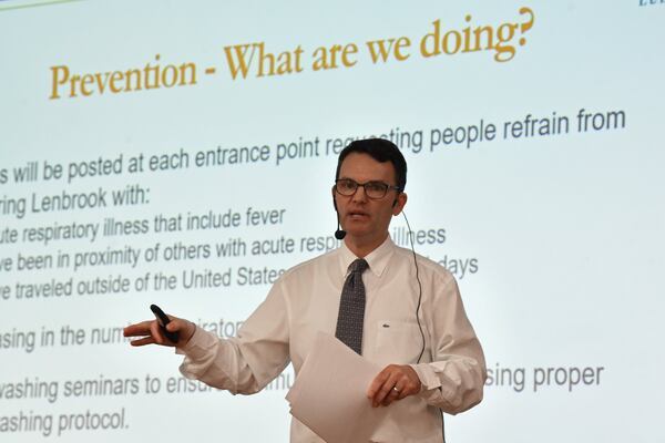 John Clark, a health services administrator at Lenbrook, speaks to residents, staff and family members during a town hall at the Buckhead facility on Thursday. Other homes are sending emails and letters to inform their communities about coronavirus procedures. Public health experts recommend care homes keep in communication with residents, staff and their families. HYOSUB SHIN / HYOSUB.SHIN@AJC.COM