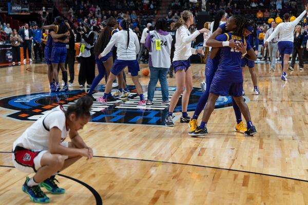 LSU players react after the Sweet 16 of the NCAA college basketball tournament against North Carolina State, Friday, March 28, 2025, in Spokane, Wash. (AP Photo/Jenny Kane)