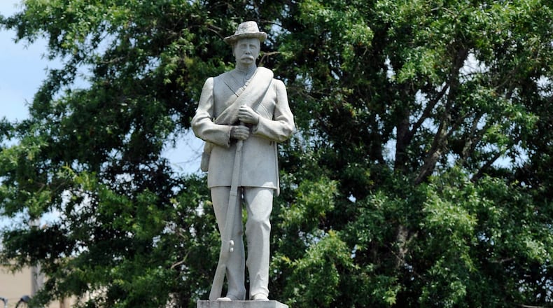 This 2018 file photo shows a Confederate monument dedicated in 1909 standing in the middle of the square in Tuskegee, Alabama. A Tuskegee councilman who once served as the city’s mayor is facing criminal charges after attempting to saw down a Confederate monument in the town square Wednesday.