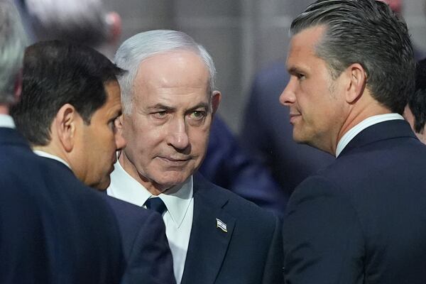 Israeli Prime Minister Benjamin Netanyahu, center, speaks to Secretary of Defense Pete Hegseth, right, and Secretary of State Marco Rubio, left, before the funeral of Sen. Lindsey Graham, R-S.C., Tuesday July 28, 2026, at the Washington National Cathedral in Washington. (Jacquelyn Martin/AP)