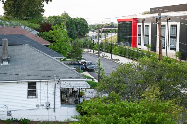 The QTS Data Center is seen in the background of the Howell Station neighborhood Wednesday, April 30, 2025, in Atlanta. (Daniel Varnado/For the AJC)