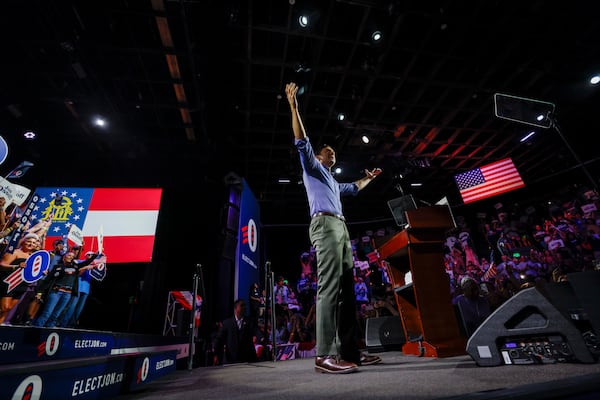 U.S. Sen. Jon Ossoff greets supporters as he takes the stage at his campaign rally at the Center Stage Theater in Atlanta last month.
(Miguel Martinez/AJC)
