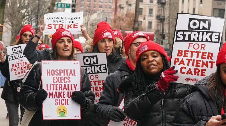Striking nurses demonstrate outside Mt. Sinai Morningside Hospital, in New York, Wednesday, Jan. 14, 2026. (AP Photo/Richard Drew)