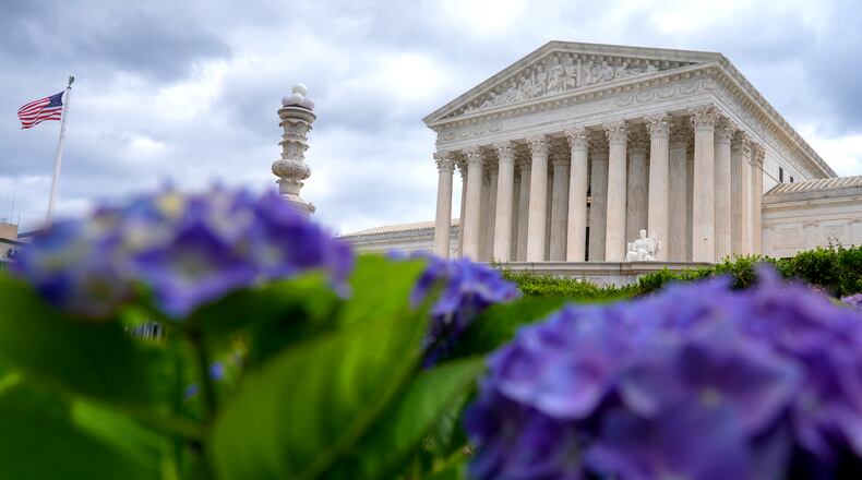 FILE - The U.S. Supreme Court is photographed, June 8, 2026, in Washington. (AP Photo/Mariam Zuhaib, File)