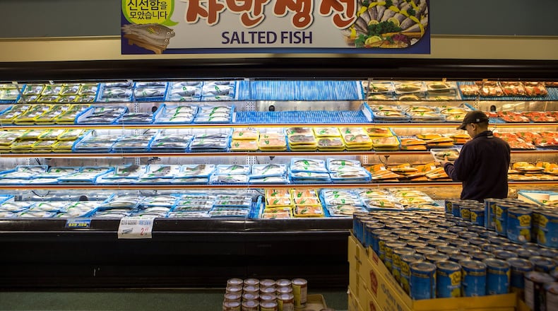 Assi International Market in Duluth features tanks of live seafood.