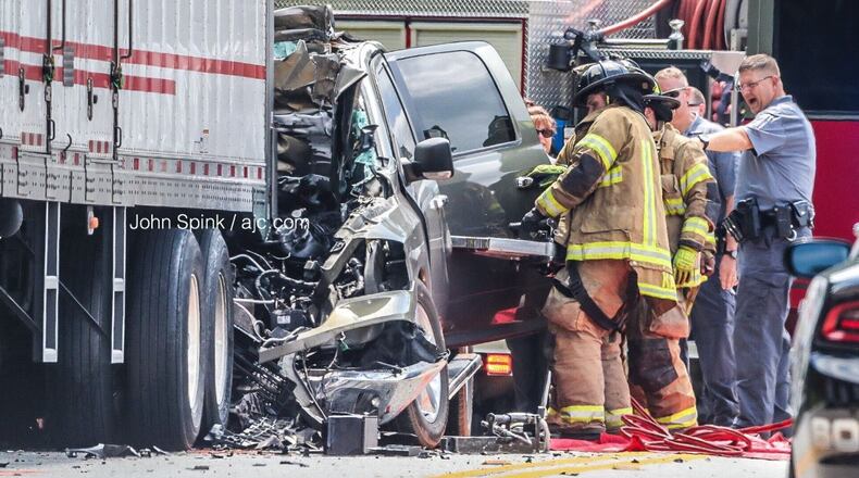 An SUV crashed into a tractor-trailer Tuesday on Campbellton Road at Fulton Industrial Boulevard.