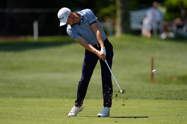 Justin Thomas hits from the eighth fairway during the first round of the RBC Heritage golf tournament, Thursday, April 17, 2025, in Hilton Head Island, S.C. (AP Photo/Mike Stewart)