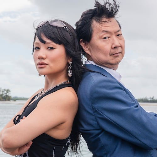 This image released by Discovery Channel shows KPop singer Rei Ami, left, and actor-comedian Ken Jeong who appear in “K-Pop Shark Heroes," kicking off Discovery's annual "Shark Week." (Tito Herrera/Discovery Channel via AP)