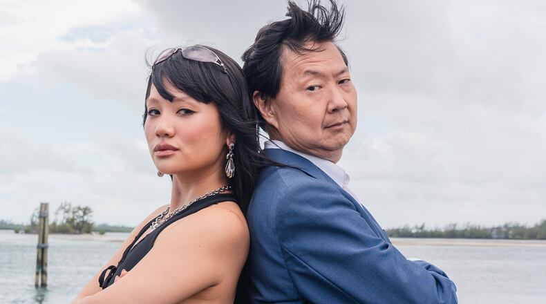 This image released by Discovery Channel shows KPop singer Rei Ami, left, and actor-comedian Ken Jeong who appear in “K-Pop Shark Heroes," kicking off Discovery's annual "Shark Week." (Tito Herrera/Discovery Channel via AP)