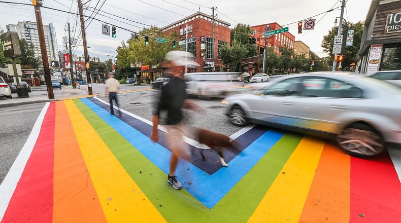 Rainbow crosswalks were painted at 10th Street and Piedmont Avenue, considered the hub of Atlanta’s LGBT community. JOHN SPINK / JSPINK@AJC.COM