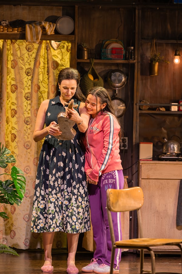 Mandy Gonzalez (left) as Mónica, the disillusioned mother of Nambi (Jaci Calderon). (Greg Mooney/Courtesy of Alliance Theatre)
