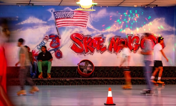 Skate Along USA in Lilburn hosts adult night on Wednesday, Aug 13, 2025. The roller skating rink will close permanently on Aug. 24 after 47 years in business. (Jenni Girtman for the AJC)