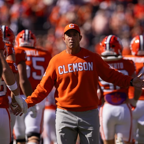 FILE - Clemson head coach Dabo Swinney greets his team before an NCAA college football game against Duke, Nov. 1, 2025, in Clemson, S.C. (AP Photo/Scott Kinser, File)