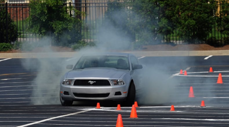 A student spins out during Ford Motor Company Driving Skills for Life Program.
