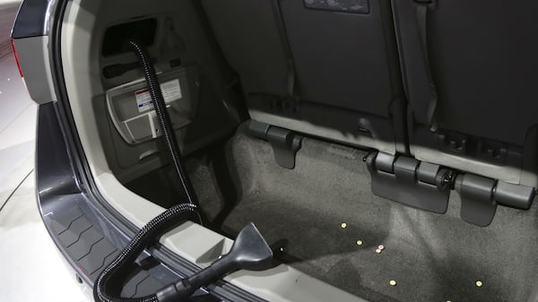 Cincinnati teen Jacob Plush, 16, died Tuesday, April 10, 2018, after he was apparently trapped and crushed to death by the third-row bench seat of his family's Honda Odyssey. Pictured is the third-row seat and rear hatch of a 2014 Honda Odyssey on display in March 2013 at the New York International Auto Show.