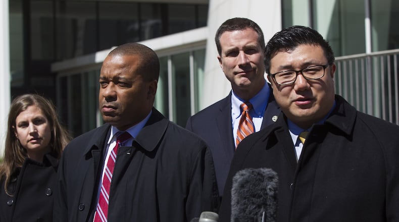 U.S. Attorney Byung “BJay” Pak, right, during a March press conference. (REANN HUBER/REANN.HUBER@AJC.COM)
