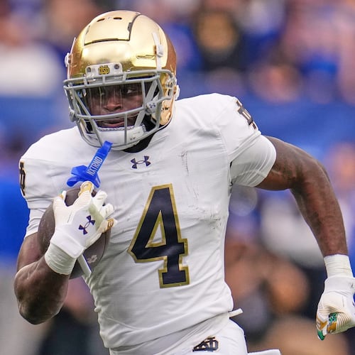 FILE - Notre Dame running back Jeremiyah Love (4) carries the ball during the first half of an NCAA college football game against Pittsburgh in Pittsburgh Saturday, Nov. 15, 2025. (AP Photo/Gene J. Puskar, File)