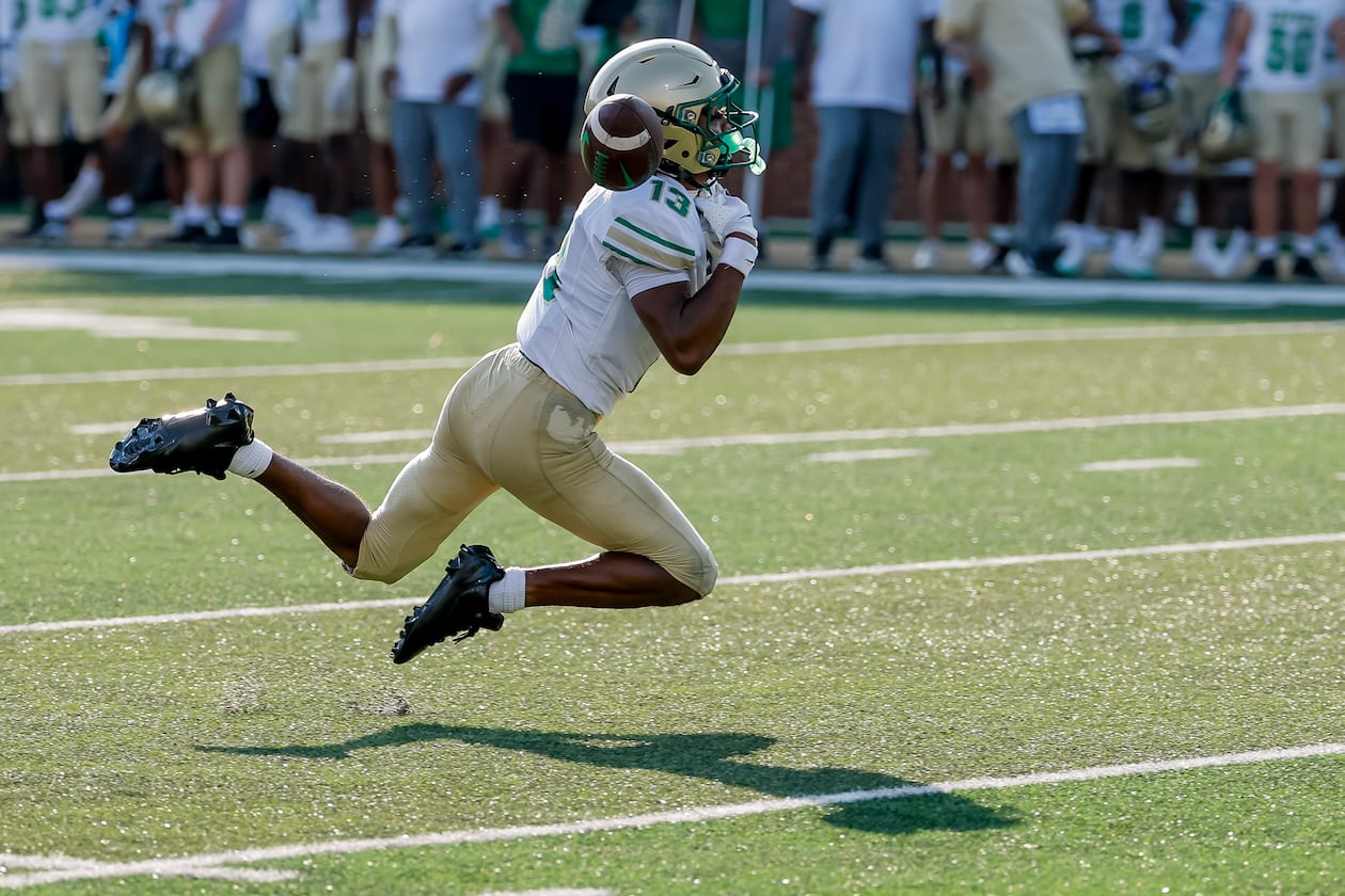 Buford's Braylon Williams misses a pass during the first half against Gainesville on Saturday, Aug. 22, 2026, in Buford. (Erik S. Lesser for the AJC)