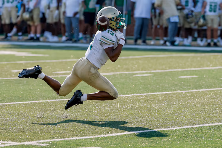 Buford's Braylon Williams misses a pass during the first half against Gainesville on Saturday, Aug. 22, 2026, in Buford. (Erik S. Lesser for the AJC)