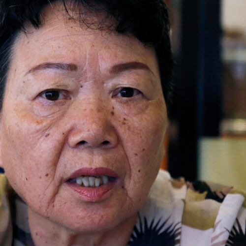 FILE - Eiko Kawasaki, a Korean born in Japan, speaks during an interview in Tokyo Friday, Aug. 24, 2018. (AP Photo/Yuri Kageyama, file)