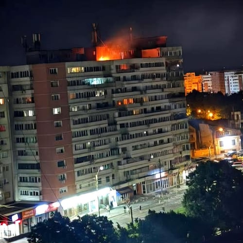 This photo released by Romania's Department for Emergency Situations shows a fire on top of a block of flats after a drone crash caused an explosion and fire on impact, in Galati, eastern Romania near the Ukrainian border, Friday May 29, 2026. (ISU Galati via AP)