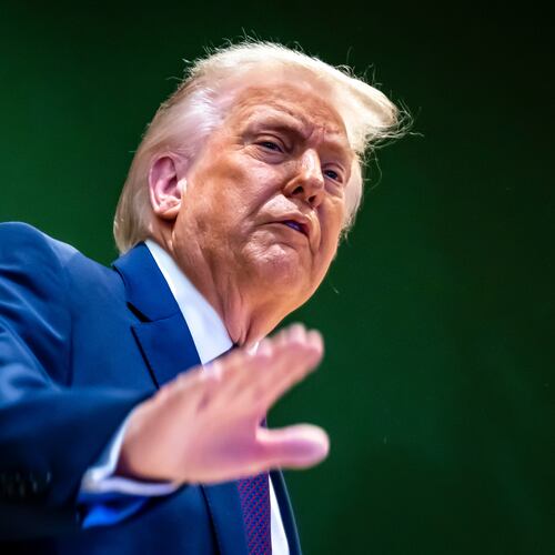 U.S. President Donald Trump gestures as he climbs a staircase after a signing ceremony of his Board of Peace initiative at the Annual Meeting of the World Economic Forum in Davos, Switzerland, Thursday, Jan. 22, 2026. (Laurent Gillieron/Keystone via AP)