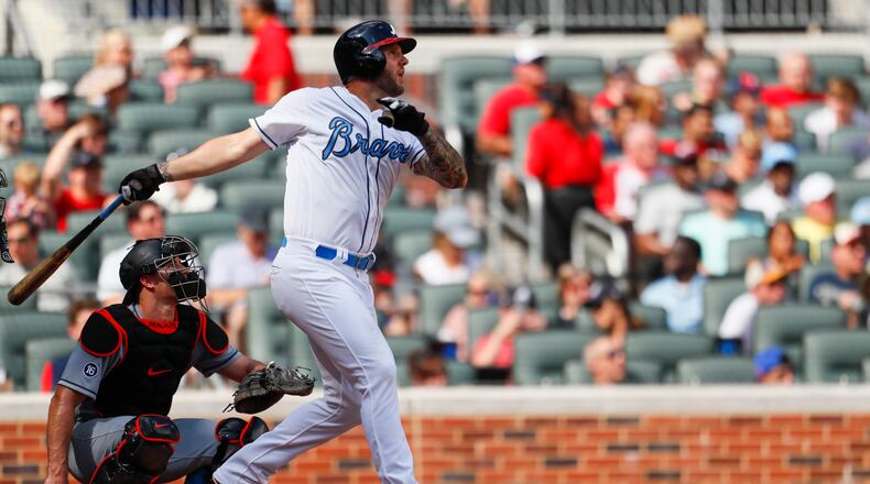 Braves first baseman Matt Adams hits a two-run home run in the third inning of a game against the Miami Marlins Saturday. (AP photo)