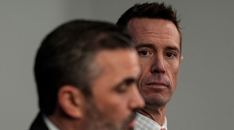 New Atlanta Falcons head coach Kevin Stefanski, left, speaks as Atlanta Falcons President of Football Matt Ryan looks on during a NFL Atlanta Falcons news conference, Tuesday, Jan. 27, 2026, in Atlanta. (AP Photo/Mike Stewart)