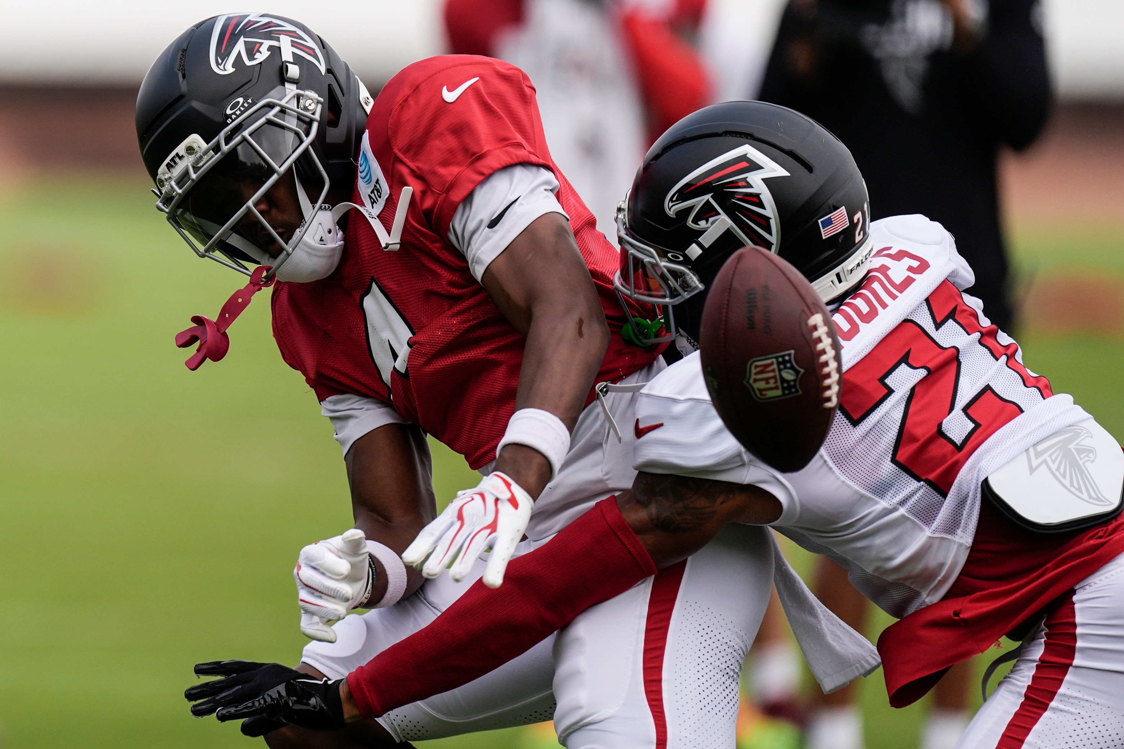 Atlanta Falcons wide receiver Jahan Dotson (left) and Atlanta Falcons cornerback Mike Hughes (right) work out during an NFL training camp, Friday, Aug. 7, 2026, in Flowery Branch, Ga. (Mike Stewart/AP)