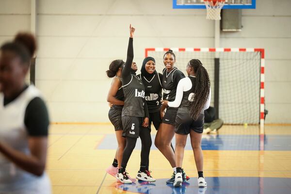 Players react during a basketball game in Aubervilliers near Paris, Sunday, April 27, 2025. (AP Photo/Thomas Padilla)
