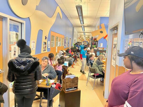 Crowds packed the DeKalb County Animal Shelter Thursday after news went out the shelter was considering euthanasia for dogs because of overcrowding.