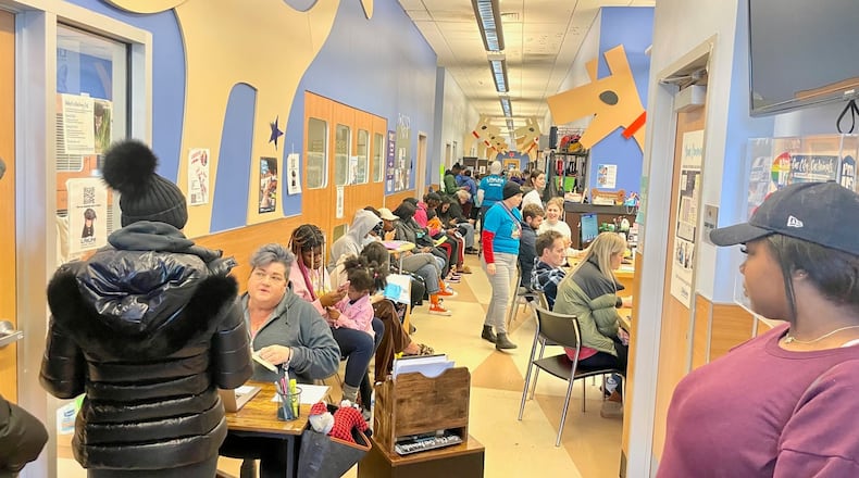 Crowds packed the DeKalb County Animal Shelter Thursday after news went out the shelter was considering euthanasia for dogs because of overcrowding.