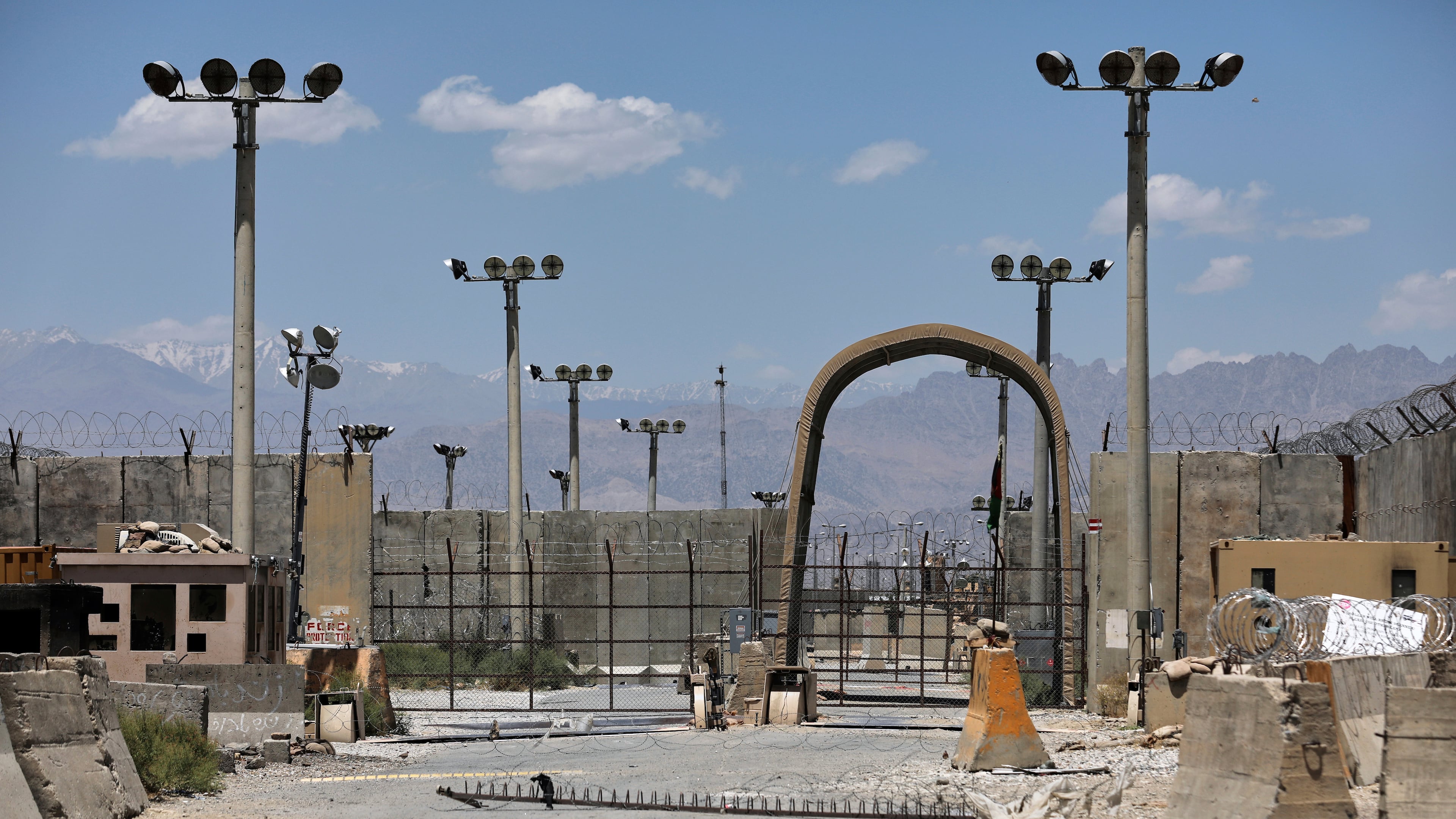 FILE - A gate is seen at the Bagram Air Base in Afghanistan, Friday, June 25, 2021. President Donald Trump has suggested he's working to reestablish a U.S. presence at Bagram Air Base in Afghanistan. That comes four years after America’s chaotic withdrawal from the country left the base in the Taliban’s hands. (AP Photo/Rahmat Gul, File)