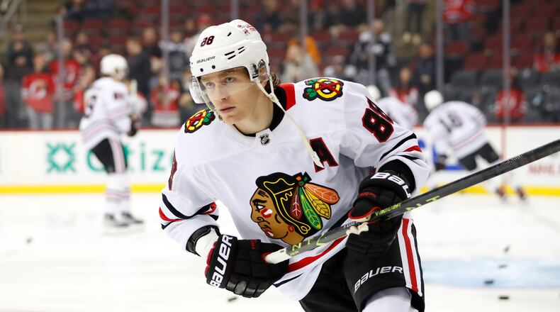 FILE - Chicago Blackhawks right wing Patrick Kane (88) skates before an NHL hockey game against the New Jersey Devils, Tuesday, Dec. 6, 2022, in Newark, N.J. (AP Photo/Noah K. Murray, File)