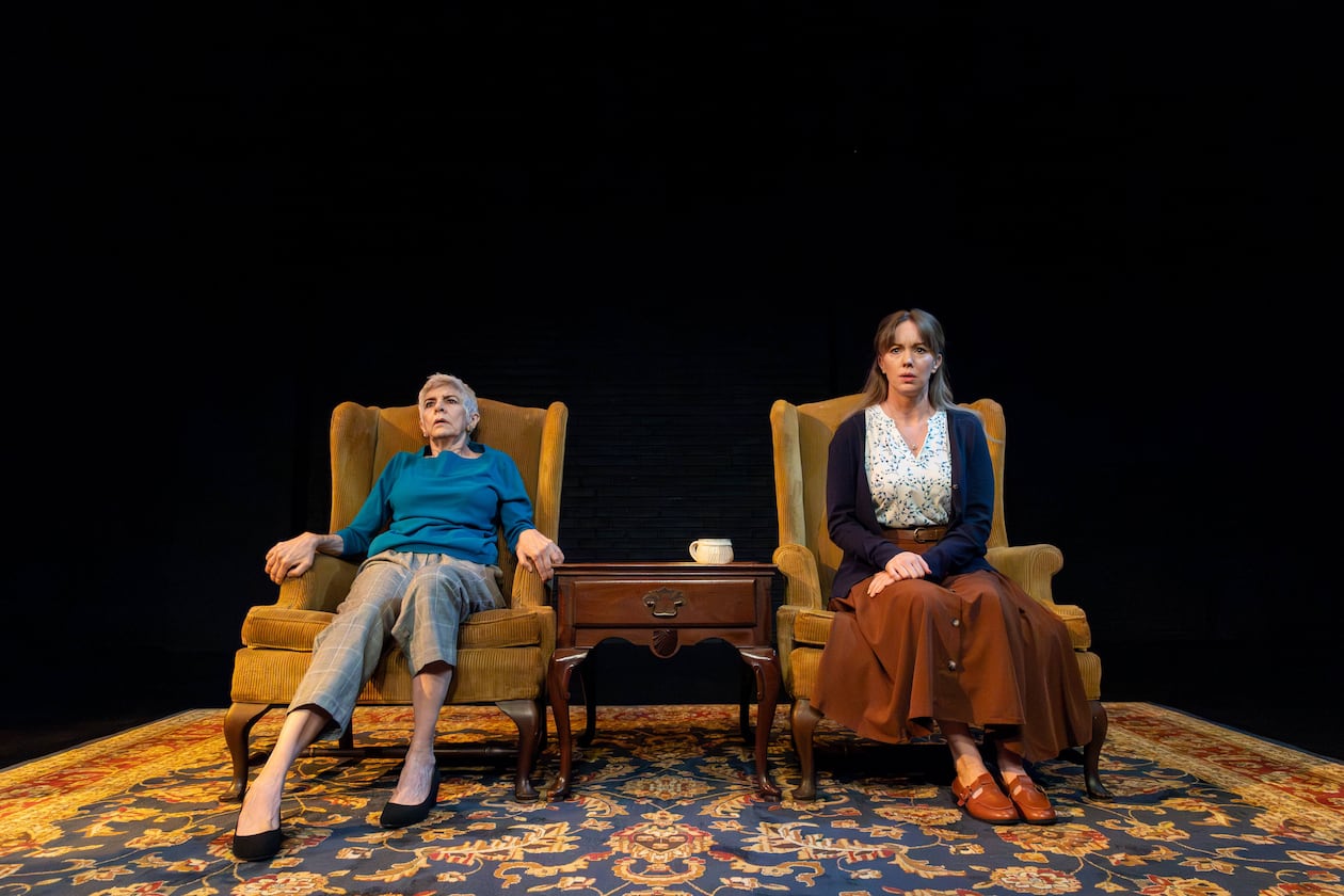 Mary Lynn Owen (left) as the mentalist Linda appears ready to bolt while keeping company with traumatized Hilda (Bethany Anne Lind) in "The Thin Place" at Actor's Express. (Photo by Casey Gardner Ford)