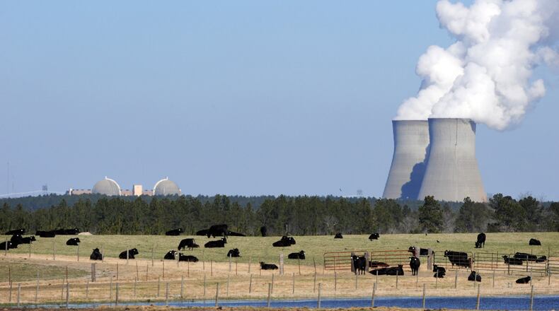 Cattle graze near the cooling towers for Georgia Power’s Vogtle nuclear power plant in Waynesboro, Ga., not far from Augusta. (Erik Lesser/Zuma Press/TNS)