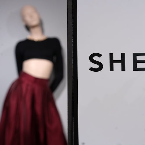FILE - Clothes by Chinese company Shein are seen in the BHV (Bazar de l'Hotel de Ville) department store, Tuesday, Nov. 4, 2025 in Paris. (AP Photo/Aurelien Morissard, File)