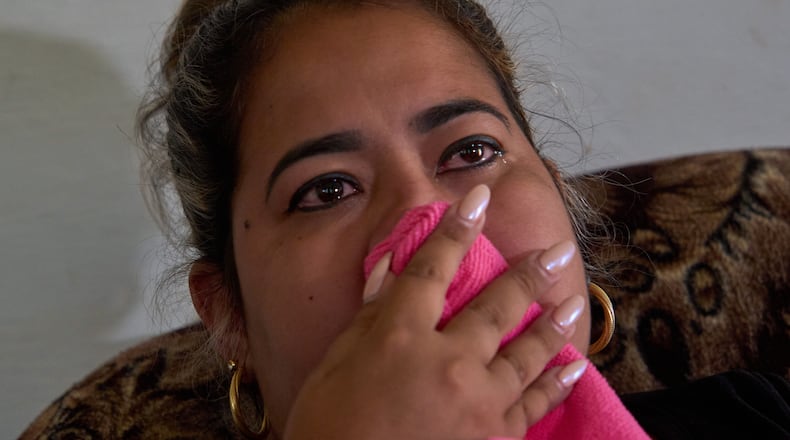 Cancer patient Irisleydis Trista Calzadilla cries during an interview at her home in Batabano, Cuba, Friday, June 26, 2026. (AP Photo/Ramon Espinosa)