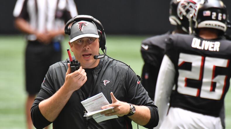 August 7, 2021 Atlanta - Atlanta Falcons head coach Arthur Smith uses a radio to communicate during the 2021 AT&T Atlanta Falcons Training Camp: Dirty Birds Open Practice at the Mercedes-Benz Stadium in Atlanta on Saturday, August 7, 2021. (Hyosub Shin / Hyosub.Shin@ajc.com)