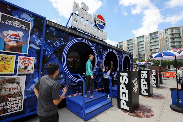 Jake Holt, of Athens, Ga., reacts after he chose Pepsi after participating in the Pepsi Challenge at The Interlock, Thursday, May 8, 2025, in Atlanta. The Pepsi Challenge is going on at various locations in Atlanta through Sunday, May 11th. (Jason Getz/AJC)