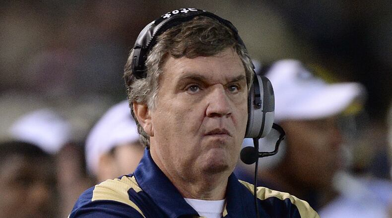 Georgia Tech head coach Paul Johnson looks at the replay screen after Georgia scored a touchdown in the second half on Saturday, November 30, 2013, at Bobby Dodd Stadium in Atlanta. Georgia won the game 41 to 34.