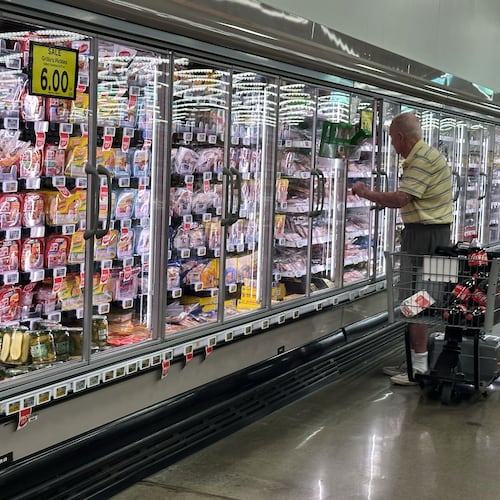 A customer shops at a grocery store in Chicago, Thursday, June 25, 2026. (AP Photo/Nam Y. Huh)