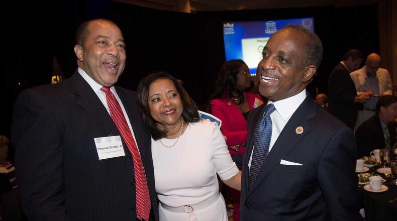 DeKalb CEO Mike Thurmond (R) talks with Thomas Dortch Jr. (L) and his wife Zola Thurmond (C) before delivering his State of the County address at a luncheon at the Thalia N. Carlos Hellenic Community Center in Atlanta on Thursday, March 30, 2017. STEVE SCHAEFER / SPECIAL TO THE AJC