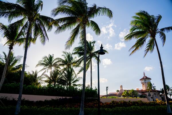 
                        Former President Donald Trump's Mar-a-Lago Club on the evening he was indicted in Manhattan, in Palm Beach, Fla., March 30, 2023. Donald J. Trump was indicted in Manhattan on Thursday for his role in paying hush money to a porn star, according to five people with knowledge of the matter. (Josh Ritchie/The New York Times)
                      