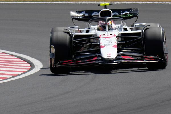 Red Bull driver Yuki Tsunoda of Japan steers his car during the third practice session for the Japanese Formula One Grand Prix at the Suzuka Circuit in Suzuka, central Japan, Saturday, April 5, 2025. (AP Photo/Shuji Kajiyama)
