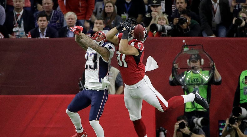 New England Patriots' Patrick Chung (23) breaks up a pass intended for Atlanta Falcons' Austin Hooper during the first half of the NFL Super Bowl 51 football game Sunday, Feb. 5, 2017, in Houston. (AP Photo/Jae C. Hong)