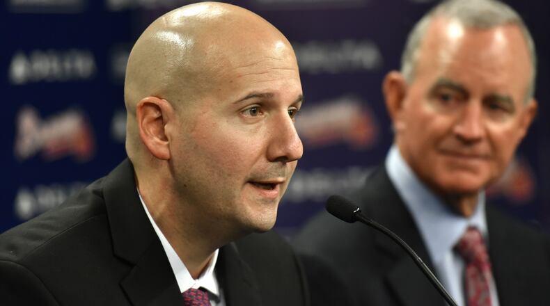 October 1, 2015 Atlanta - New general manager John Coppolella speaks as Braves president of baseball operations John Hart looks during a press conference at Turner Field on Thursday, October 1, 2015. The Atlanta Braves have promoted John Coppolella to general manager following three seasons as assistant GM. The move was announced on Thursday by Braves president of baseball operations John Hart. The team said in a statement Coppolella has agreed to a four-year contract through the 2019 season, a term that will include the Braves' first three seasons at their new SunTrust Park. HYOSUB SHIN / HSHIN@AJC.COM